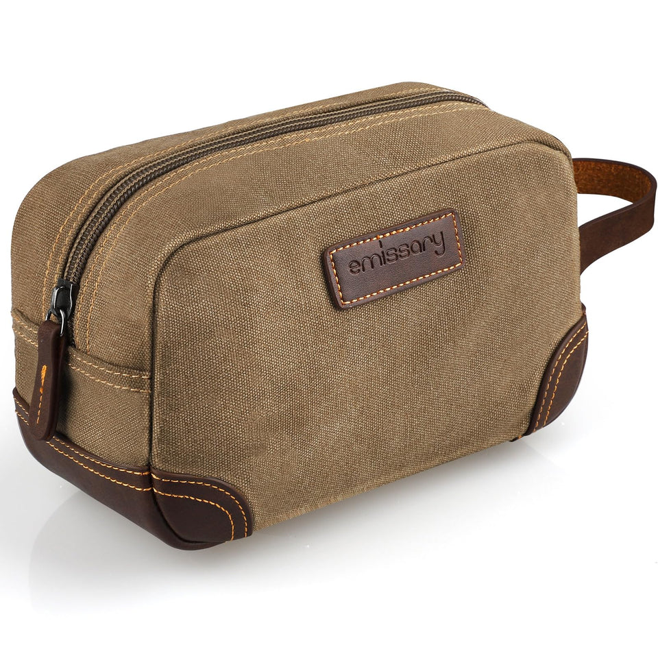 Emissary travel toiletry bag in brown, front view showing rugged canvas and leather trim for organized trips.