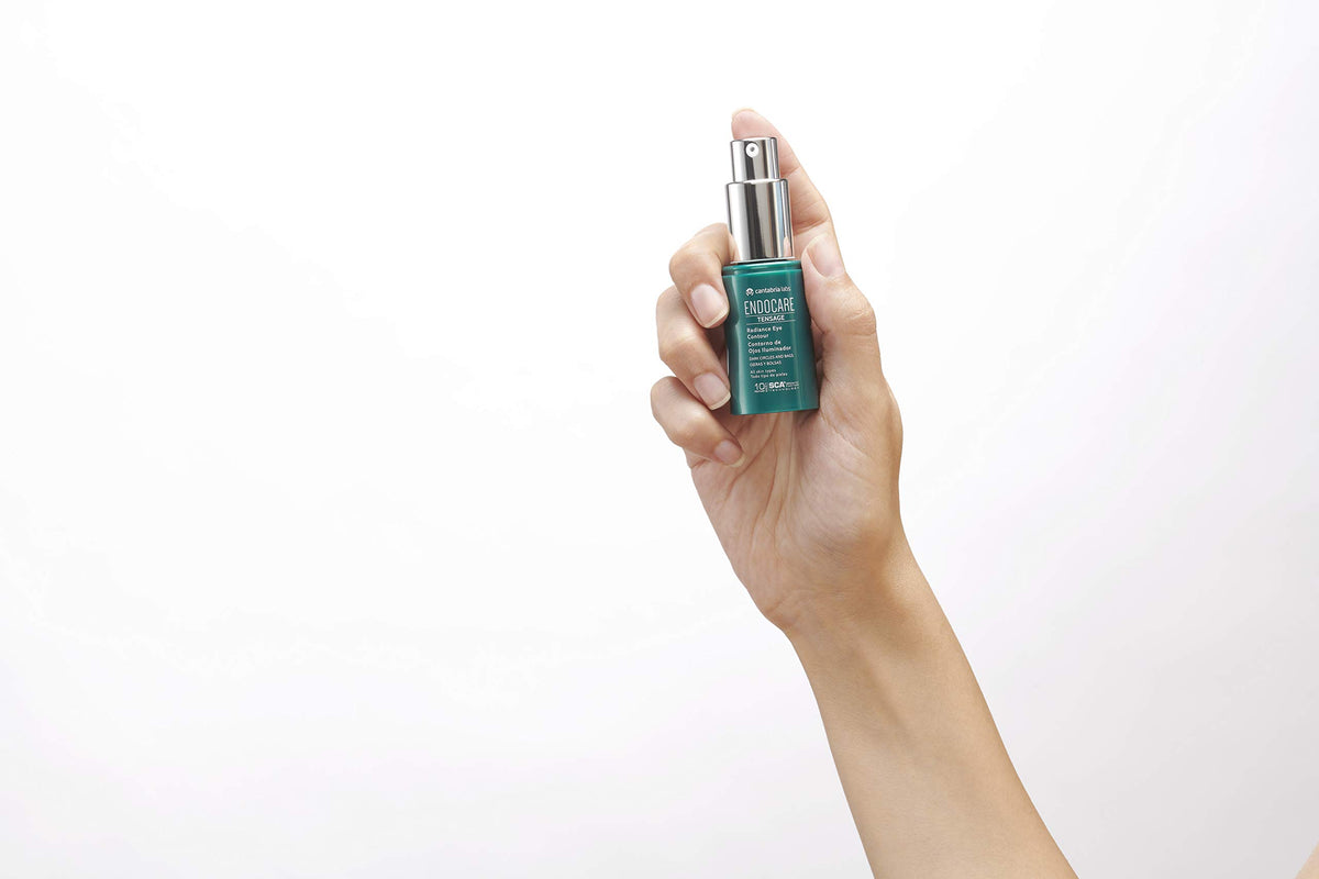 Endocare Tensage Eye Contour Radiance during massage demonstrates gentle self-care for eye area