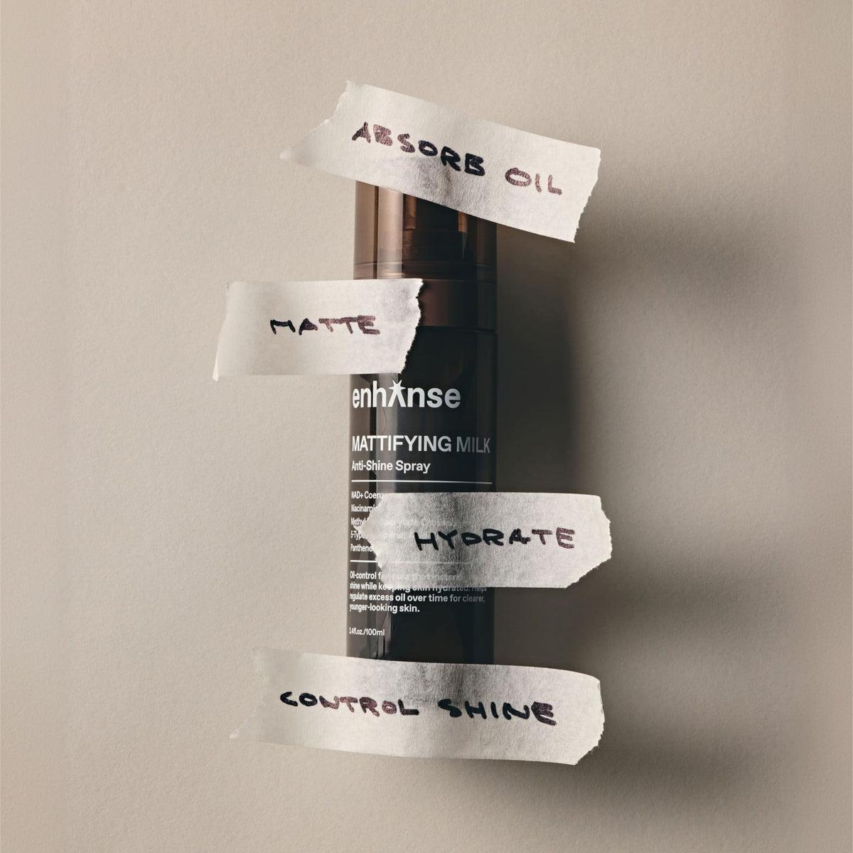 Enhanse Mattifying Milk mist applied to face to reduce shine