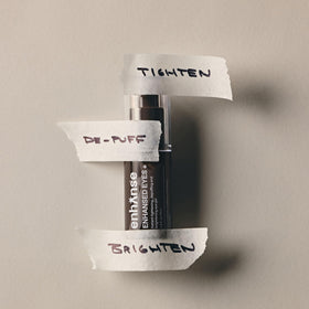 Enhanse Under Eye Gel ingredients label highlights caffeine and RejuveNAD for revitalizing potential.