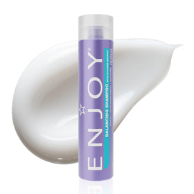 Enjoy Balance Shampoo bottle closeup showing a gentle sulfate-free cleanse for all hair types.