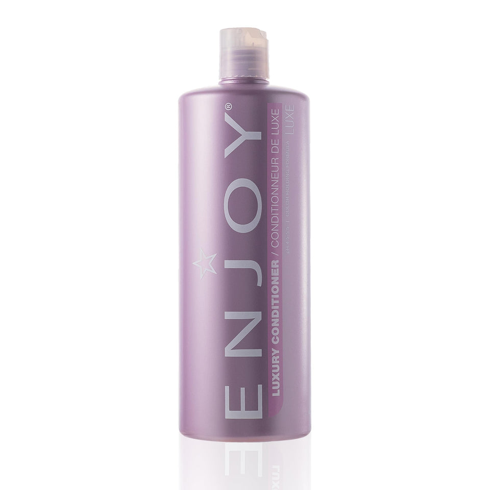 Enjoy Luxury Conditioner bottle demonstrates frizz-control for smooth, hydrated hair