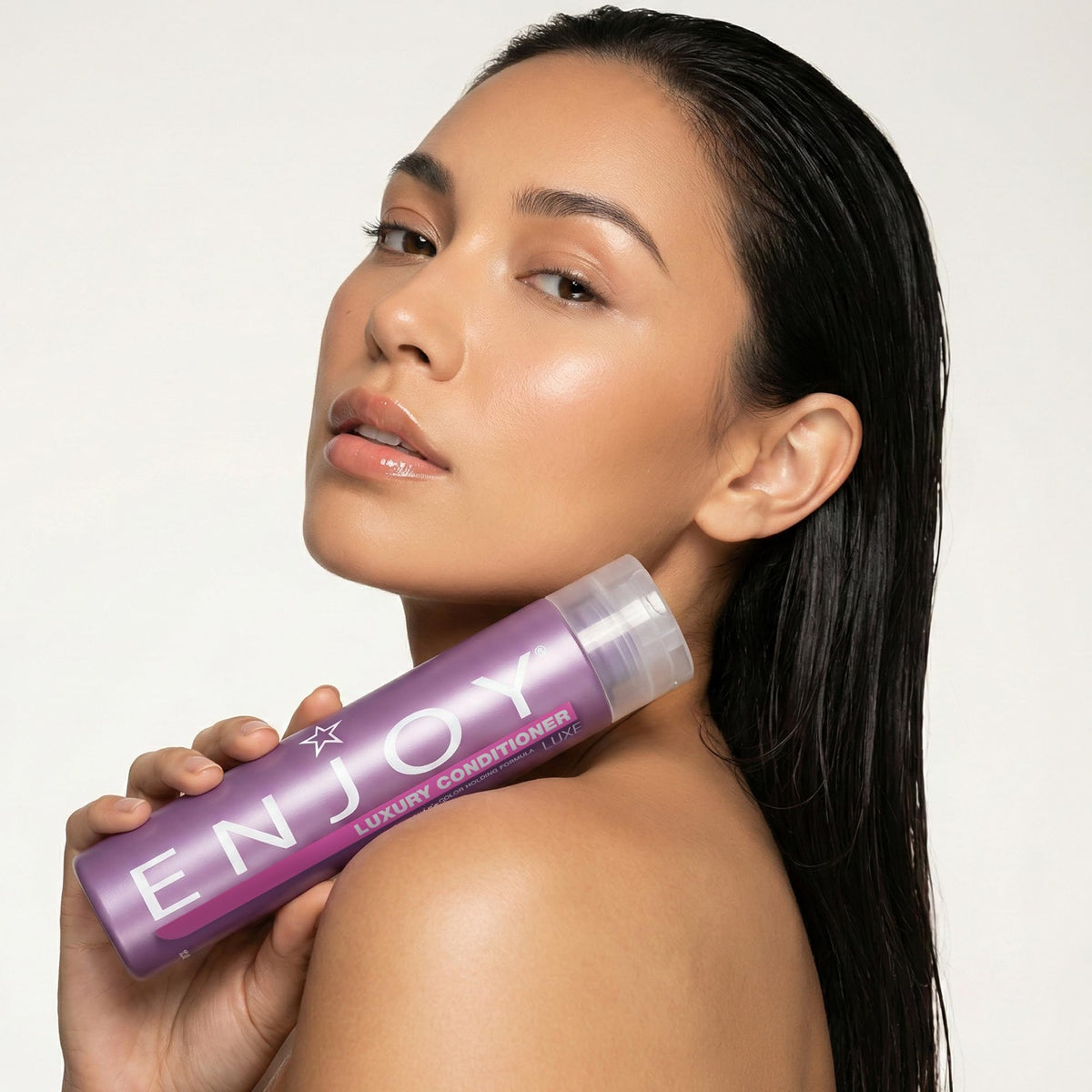Packaging closeup of Enjoy Luxury Conditioner highlights sulfate-free formula