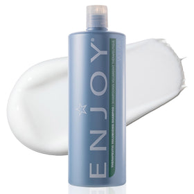 Enjoy Therapeutic Volumizing Shampoo bottle pour for easy application and scalp refreshment