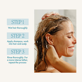 Enjoy Therapeutic Volumizing Shampoo rinsing hair demonstrating clean, residue-free finish