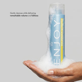 Enjoy Volumizing Shampoo foam lather showing gentle cleansing for limp hair