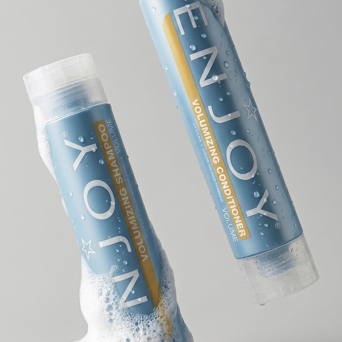 Enjoy Volumizing Shampoo packaging highlighting clean, sulfate-free cleansing experience