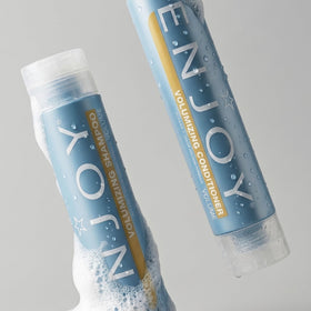 Enjoy Volumizing Shampoo packaging highlighting clean, sulfate-free cleansing experience