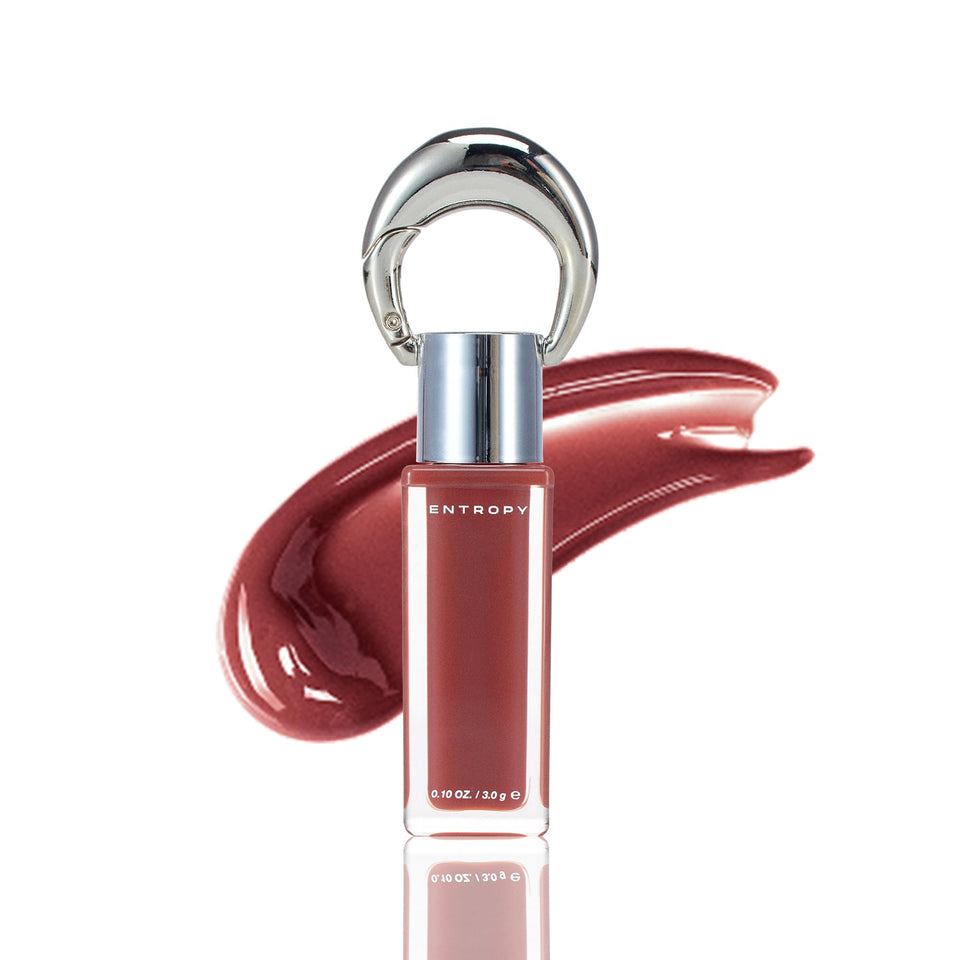 Entropy Make Up Amber Charm glossy lip tint closeup with high shine and hydrating comfort