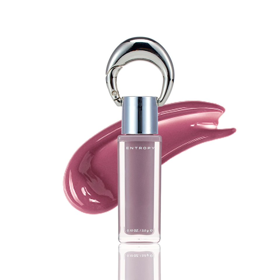 ENTROPY MAKE UP glossy lip tint soft mauve glow on lips.