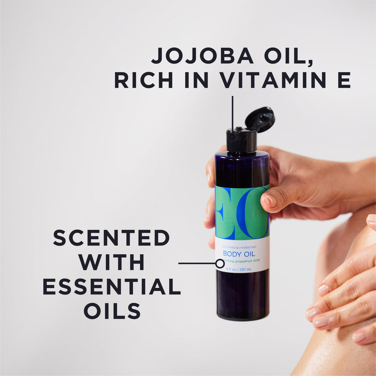 EO Grapefruit Mint Body Oil pour shot highlighting minty coolness.