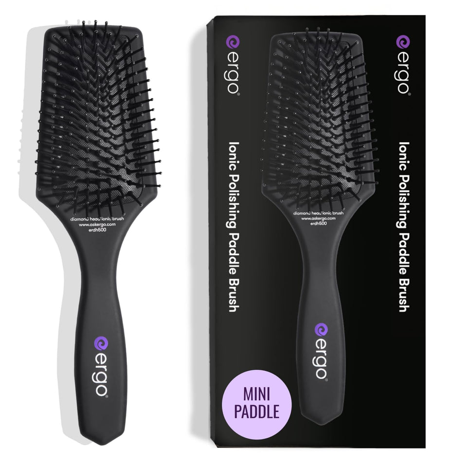 ERGO Mini Ionic Polishing Paddle Brush close-up showing ergonomic grip for easy detangling.