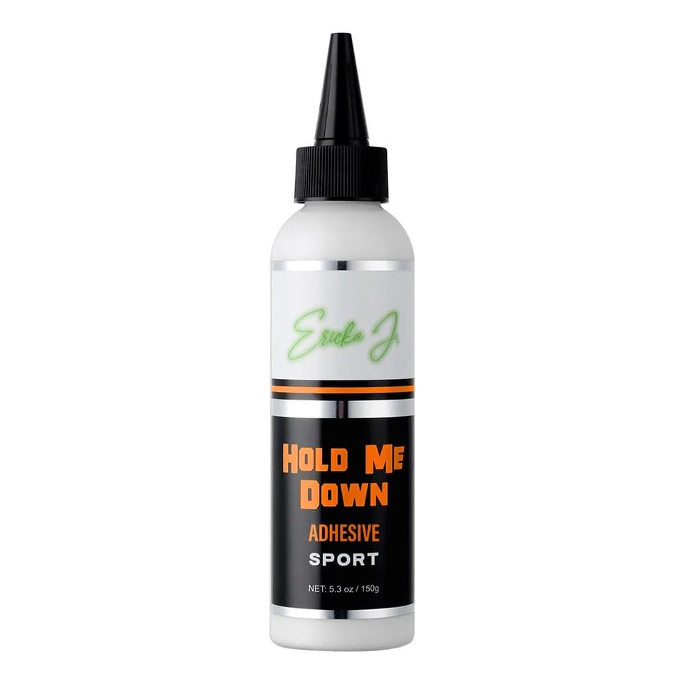 Ericka J Hold Me Down adhesive bottle pour shows peach-scented, sweat-resistant hold for lace wigs.
