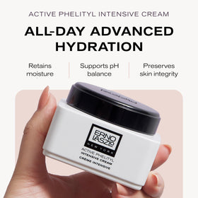 Erno Laszlo Active Phelityl Intensive Cream jar on desk signals premium daily hydration.