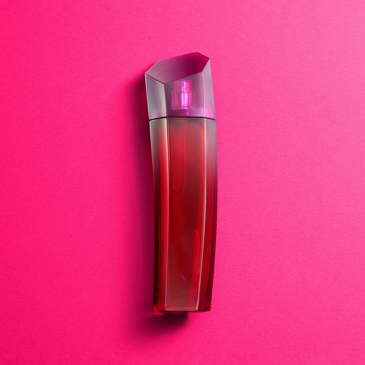 Escada Magnetism spray on pulse points demonstrates easy, discreet application
