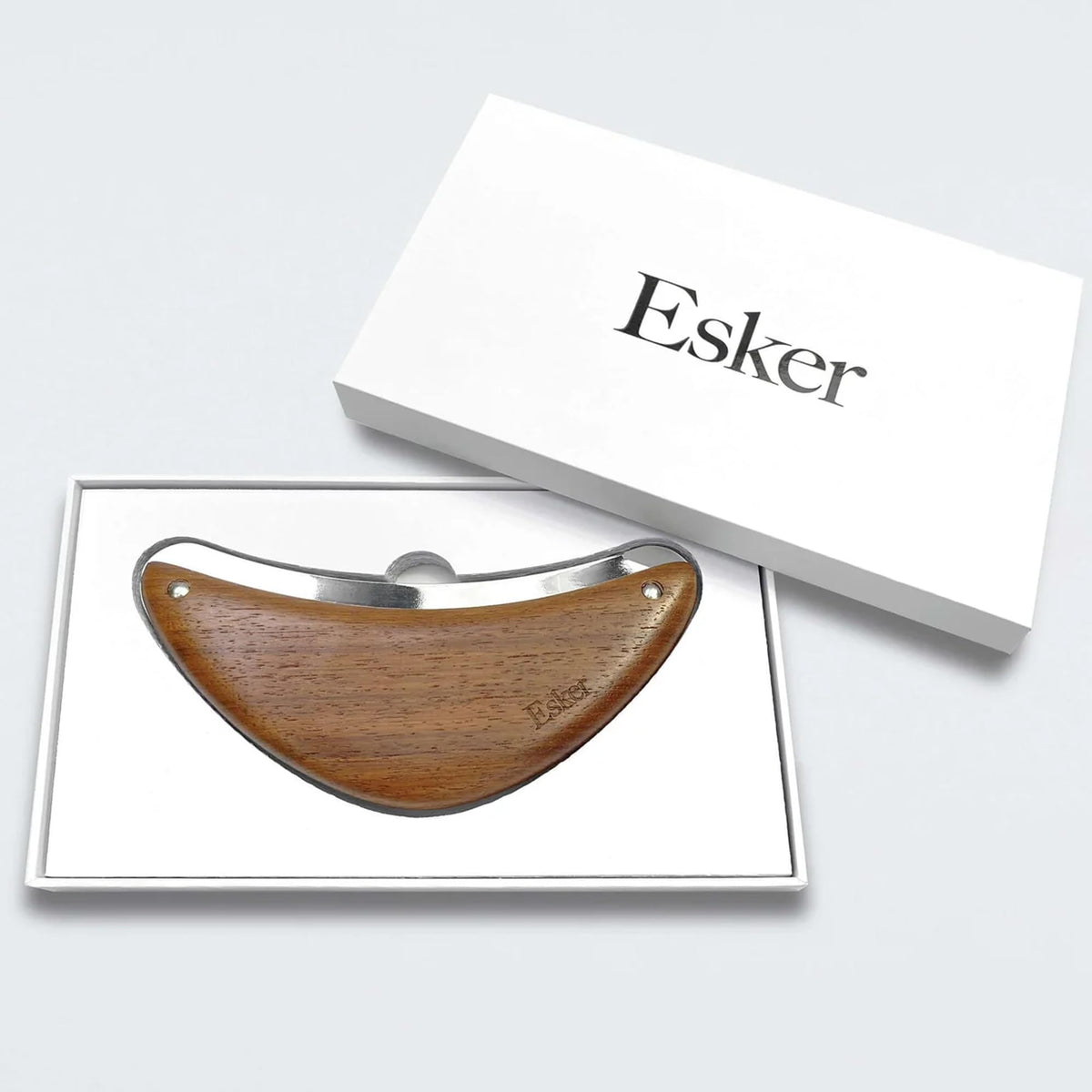 ESKER Body Plane sterling silver blade delivering gentle exfoliation for refreshed skin.