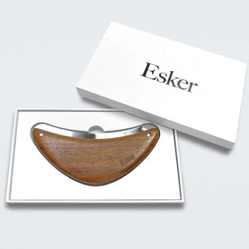 ESKER Body Plane sterling silver blade delivering gentle exfoliation for refreshed skin.