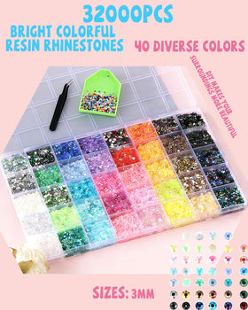 EsmeeSis precision tweezers and dotting pens for precise rhinestone placement.