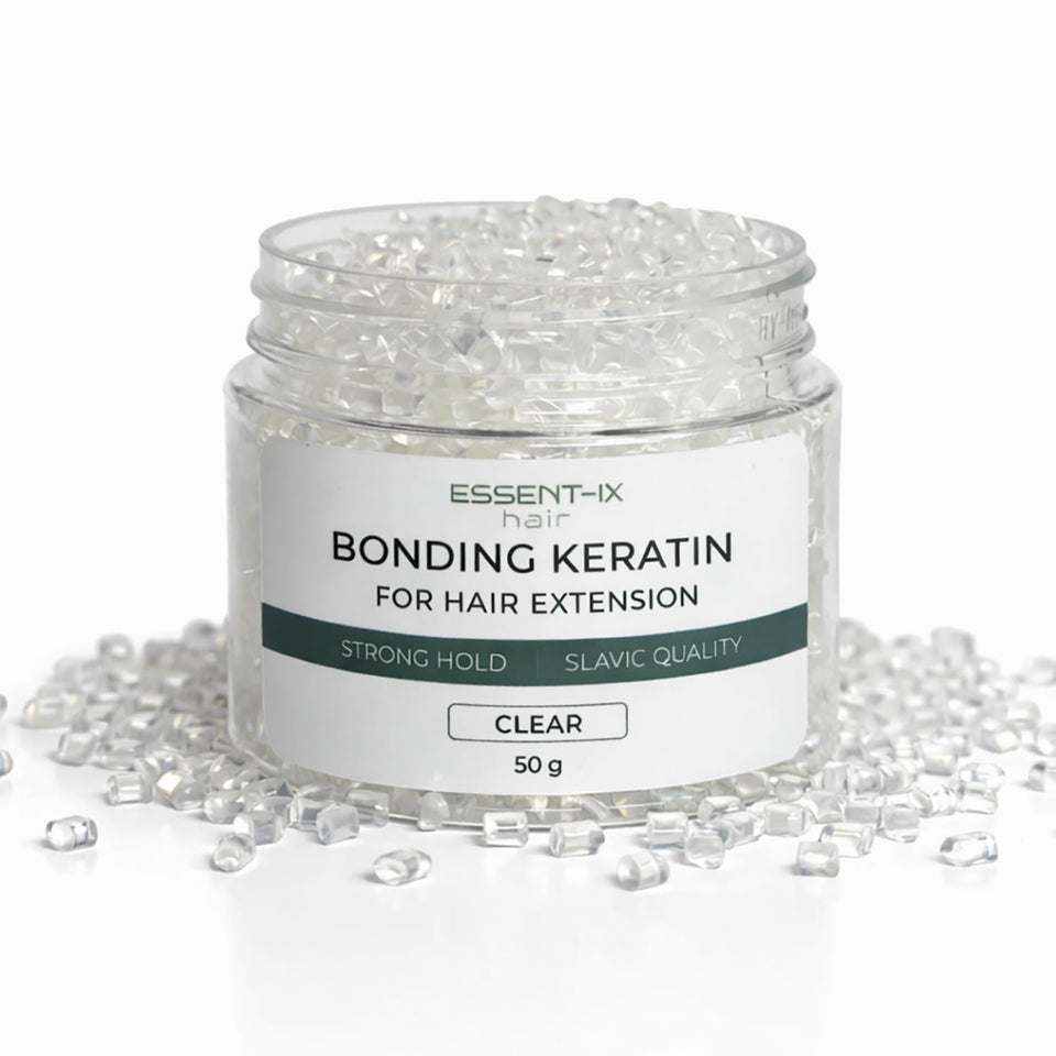 ESSENT-IX keratin beads bottle close-up showing premium quality for extensions.