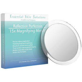 Essential Skin Solutions 15x magnifying mirror closeup for precise makeup and tweezing.