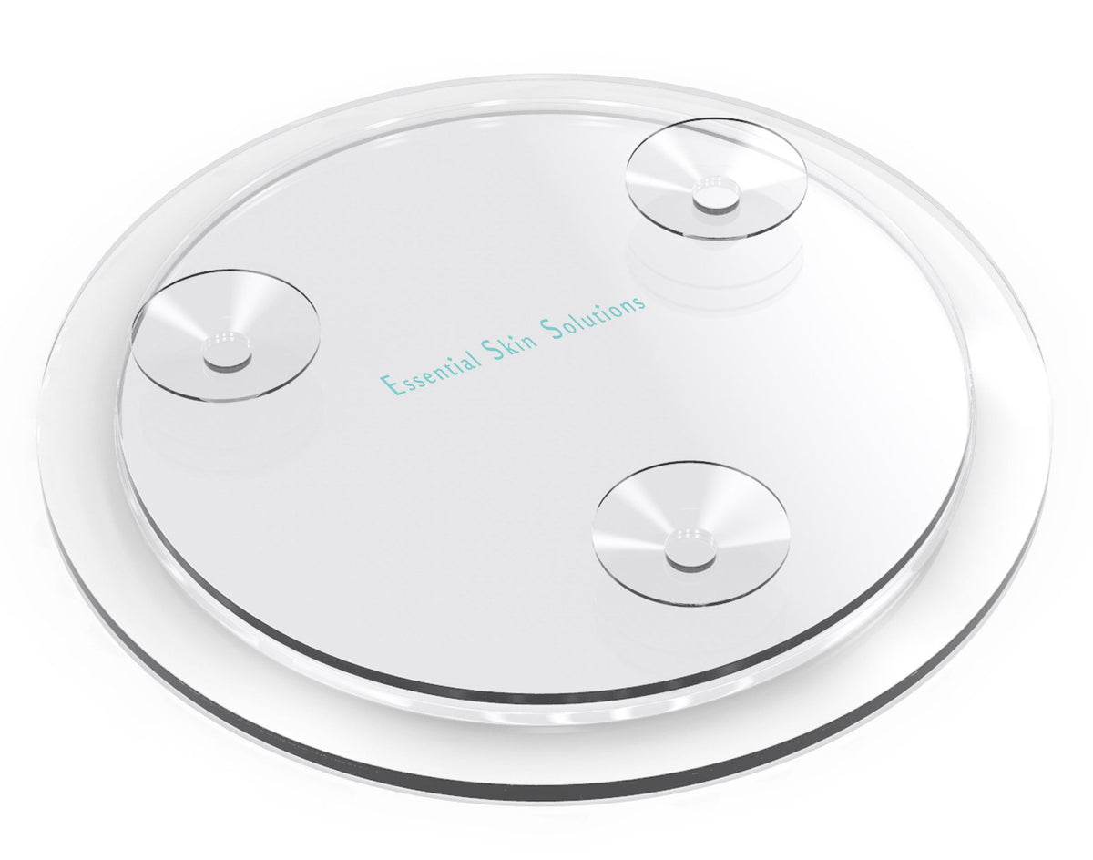 Essential Skin Solutions close-up tweezing and blemish removal with high magnification.