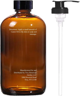 Close-up shows the olive peppermint label on Essentially KateS castor oil.