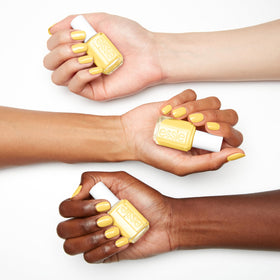 essie sun-renity nails during application highlight glossy pink-yellow undertone shine