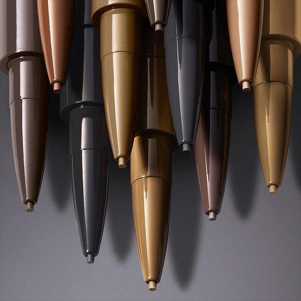 Estée Lauder BrowPerfect spool brush for precise brow grooming.