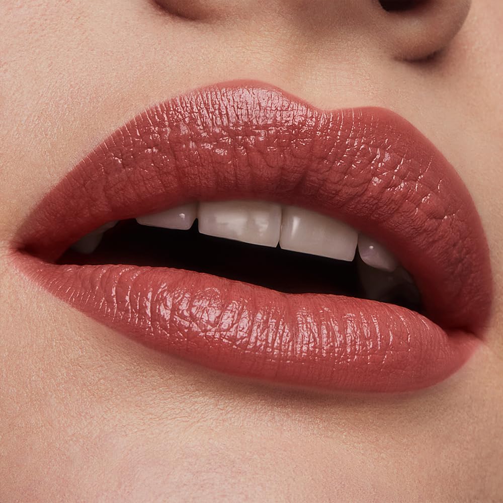 Rose Tea shade on lips under natural light with satin finish.