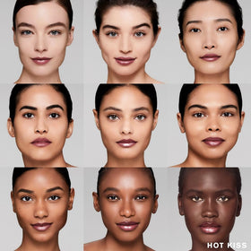 Estée Lauder Hi-Lustre lipstick application closeup suggests smooth glide