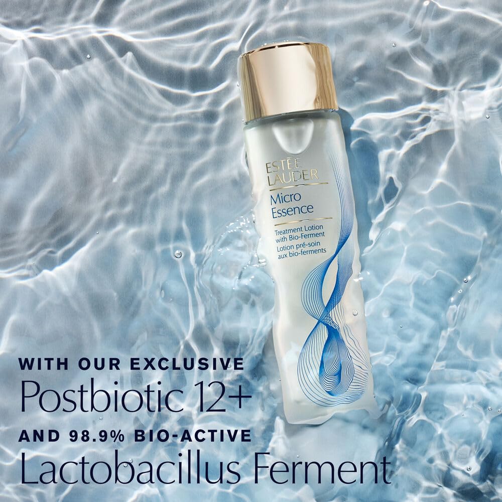 Estée Lauder Travel-size Micro Essence bottle cap close-up for on-the-go routines.