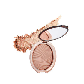 Estée Lauder Bronze Goddess Highlighting Powder Gelee compact delivers a sun-kissed glow on cheeks