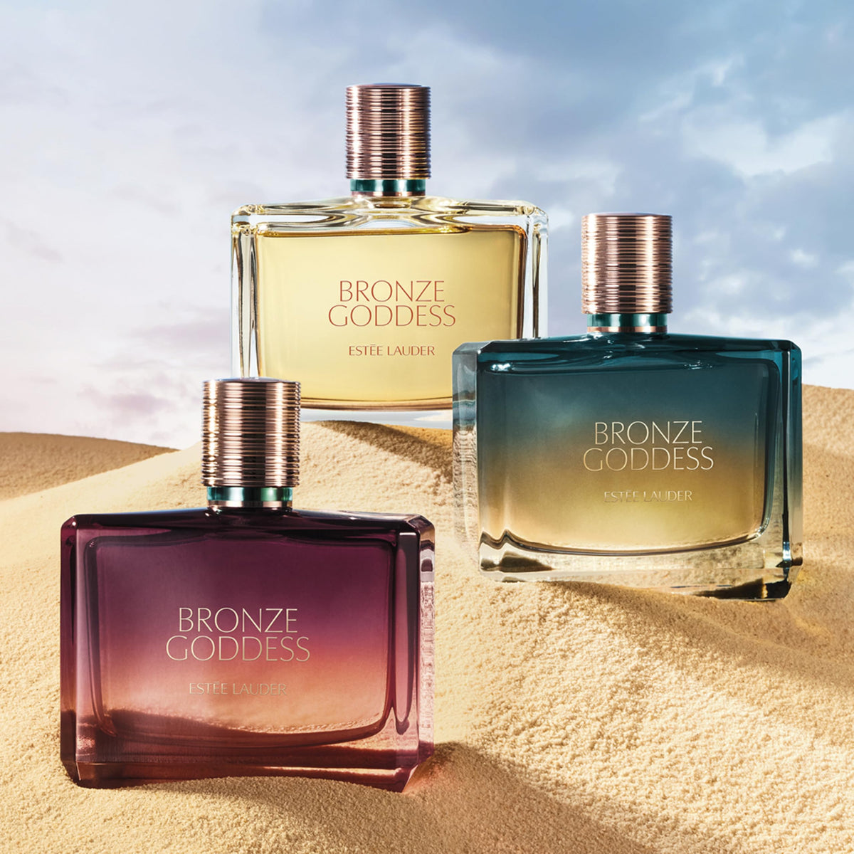 Estée Lauder Bronze Goddess packaging box beside bottle, ideal for gifting.