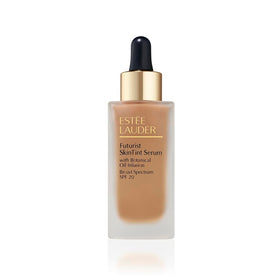 Estée Lauder Futurist Skin Tint Serum bottle pour demonstrates easy blending and radiant skin