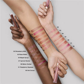 Estée Lauder Glossy Pout Lip Oil in Strawberry Milk close-up showing luminous gloss.