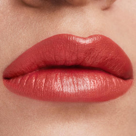 Estée Lauder Pure Color Hi-Lustre swatch on skin reveals shimmering, even color