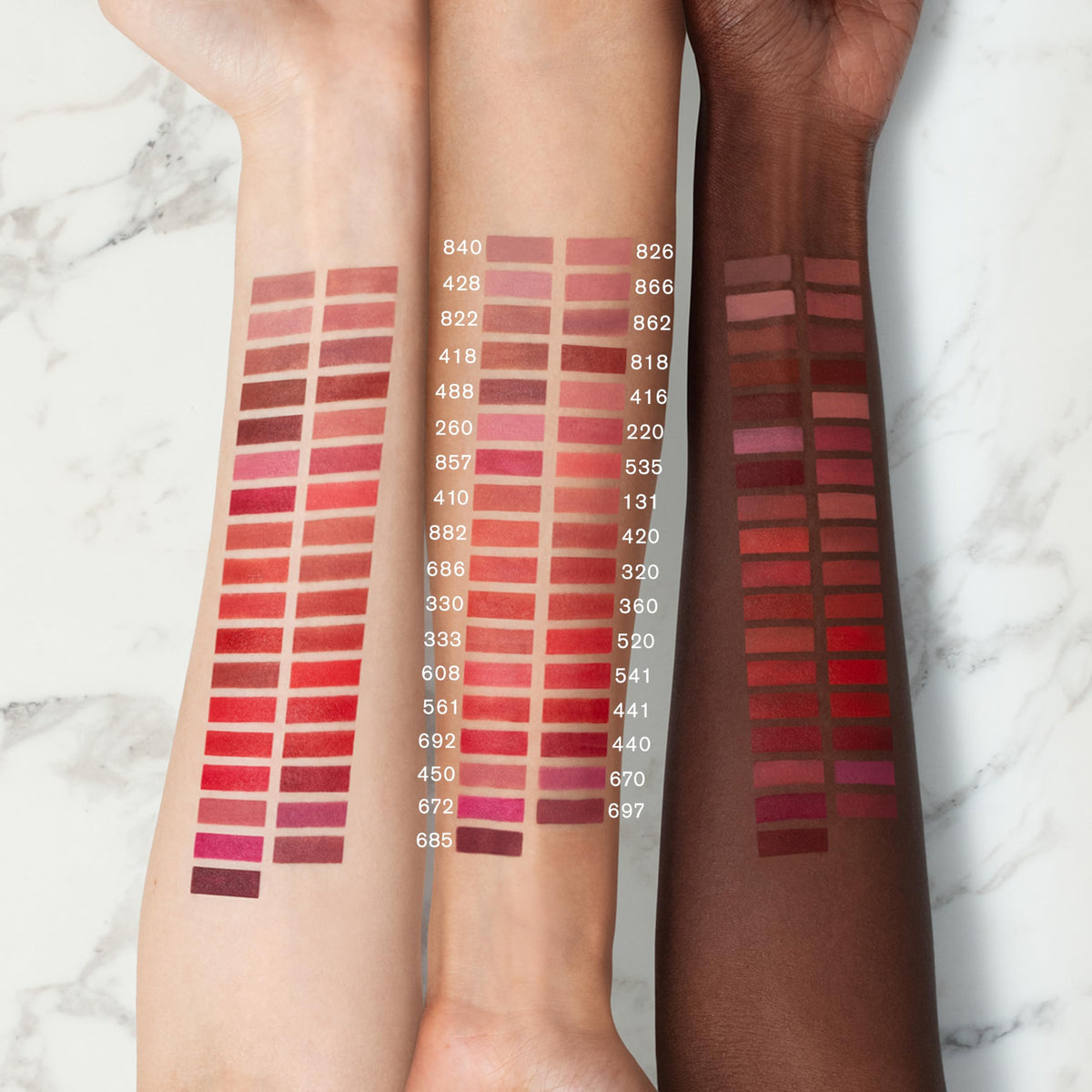 Estée Lauder Pure Color Long-Lasting Matte Lipstick swatch on lips showing rich matte color