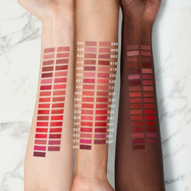 Estée Lauder Pure Color Long-Lasting Matte Lipstick swatch on lips showing rich matte color