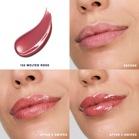 Applying Estee Lauder Melt-On Glosstick heats on contact for a smooth glaze.