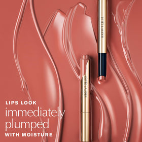 Estee Lauder Pure Color Melt-On Glosstick mirror shine on lips.