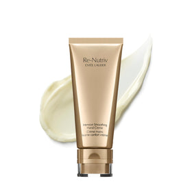 Estee Lauder Re-Nutriv hand cream bottle pour showing luxurious hydration.