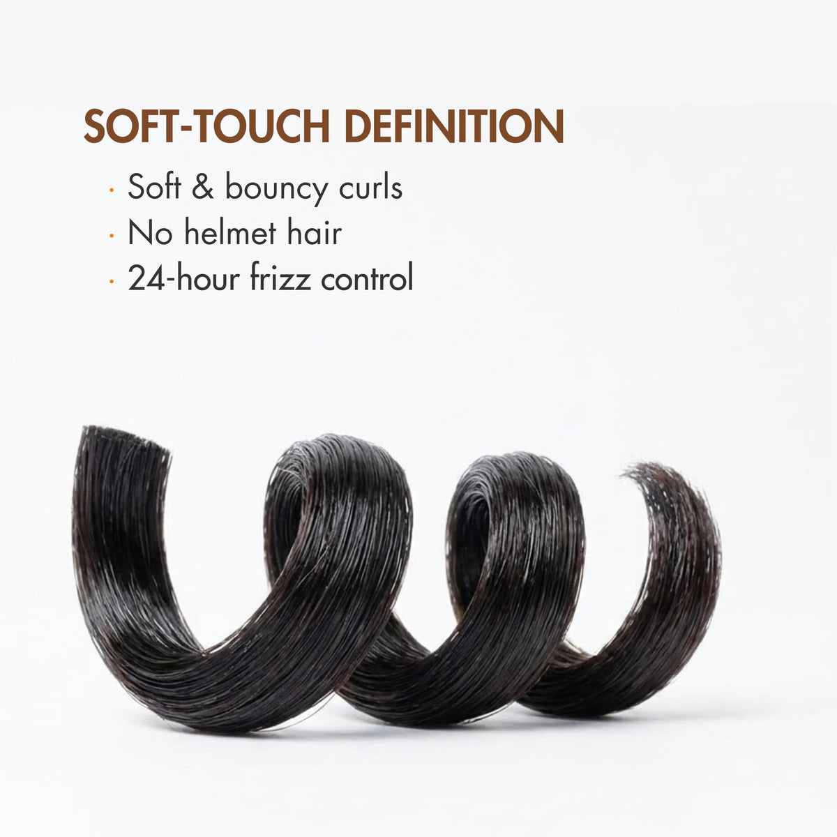 ETNIKER curls definition demonstrated on hands for bounce and shine.