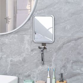 Ettori mirror mounted in a contemporary bathroom vanity area