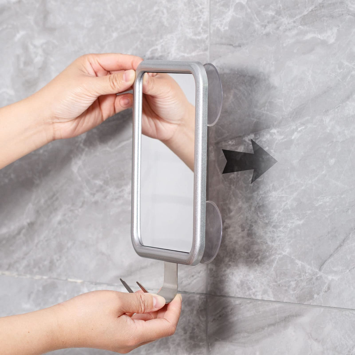 Integrated stainless steel hook on Ettori shower mirror
