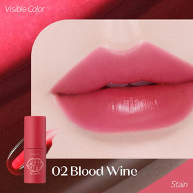 ETUDE Dear Darling Lip Stain Blood Wine lip swatch on lips showing vibrant color and longevity.