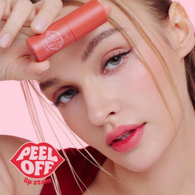 ETUDE Dear Darling texture swatch on lips shows bright pigment.