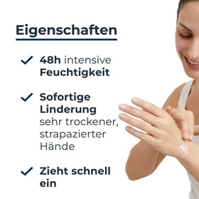 Applying Eucerin Repairing Hand Cream to a hand for quick absorption.