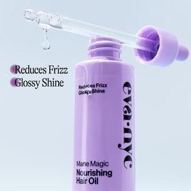 Bottle of EVA NYC Mane Magic Nourishing Hair Oil indicating keratin and color-treated safety.