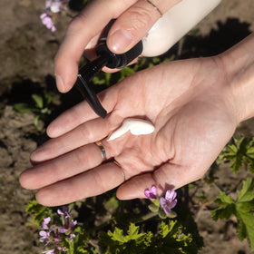 Rose geranium droplets with Evanhealy cleanser for refreshing skin.