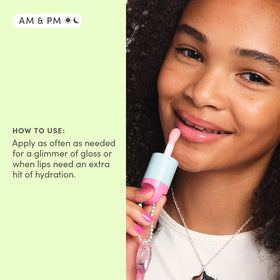 Evereden Happy Kids lip oil sakura pink gloss on lips, gentle color and nourishment.